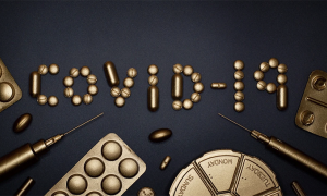 covid scritta oro siringhe